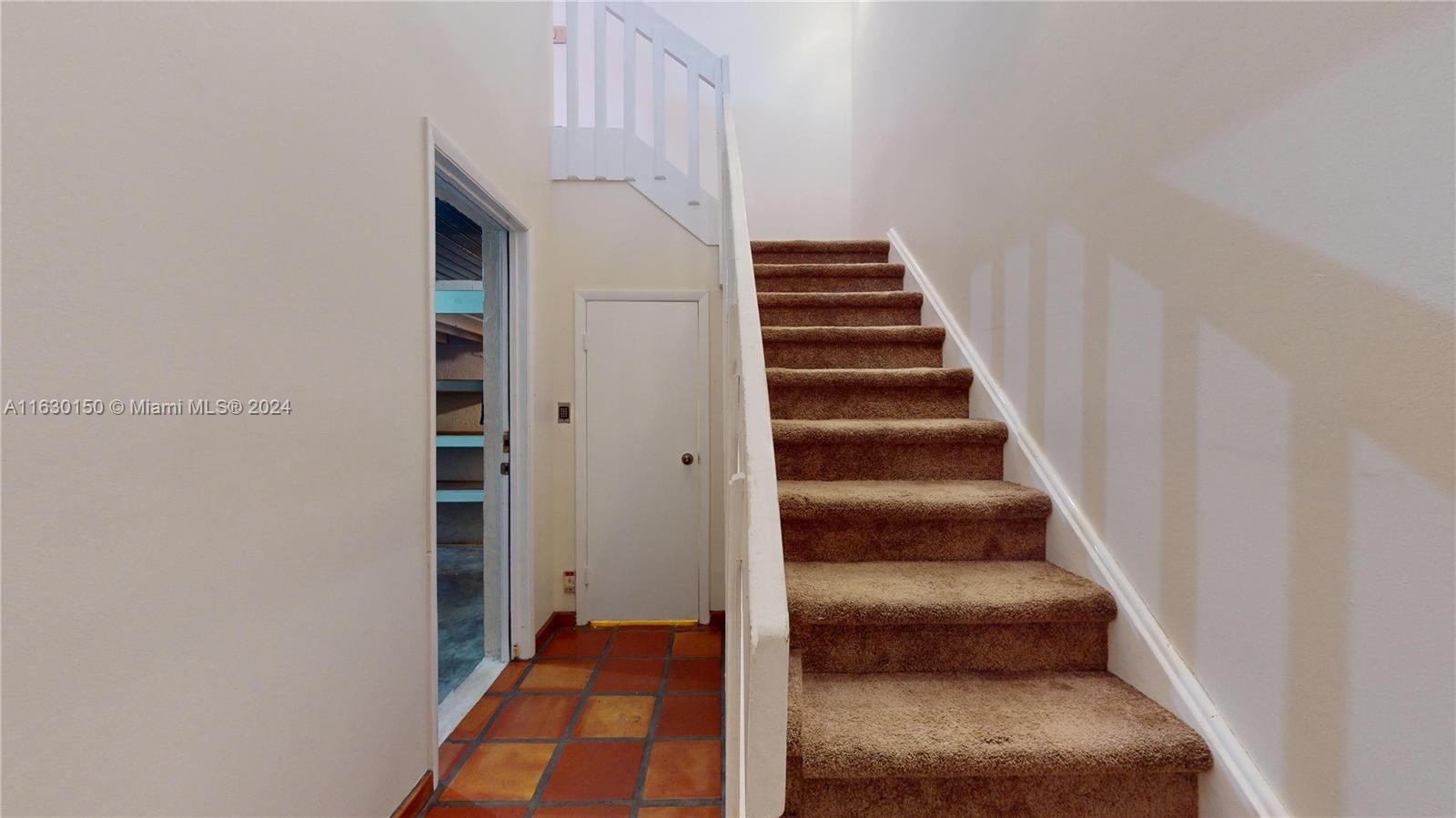 10665 Southwest 113th Place, Unit 95D Miami, FL 33176 - Photo 6 of 42 a view of entryway with stairs