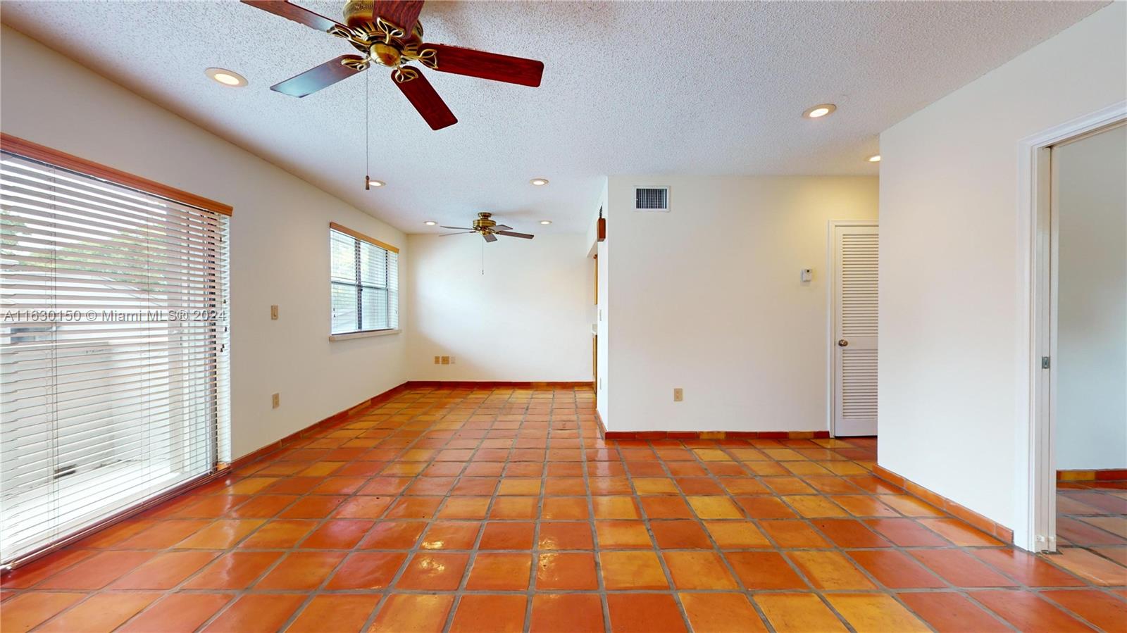 10665 Southwest 113th Place, Unit 95D Miami, FL 33176 - Photo 9 of 42 a view of an empty room