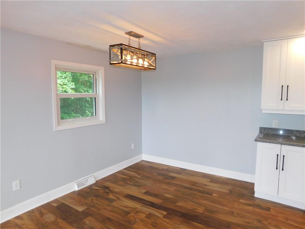2413 Kane Road Aliquippa, PA 15001 - Photo 8 of 14 Cozy Dining Room with Beautiful a brand new Light fixture.