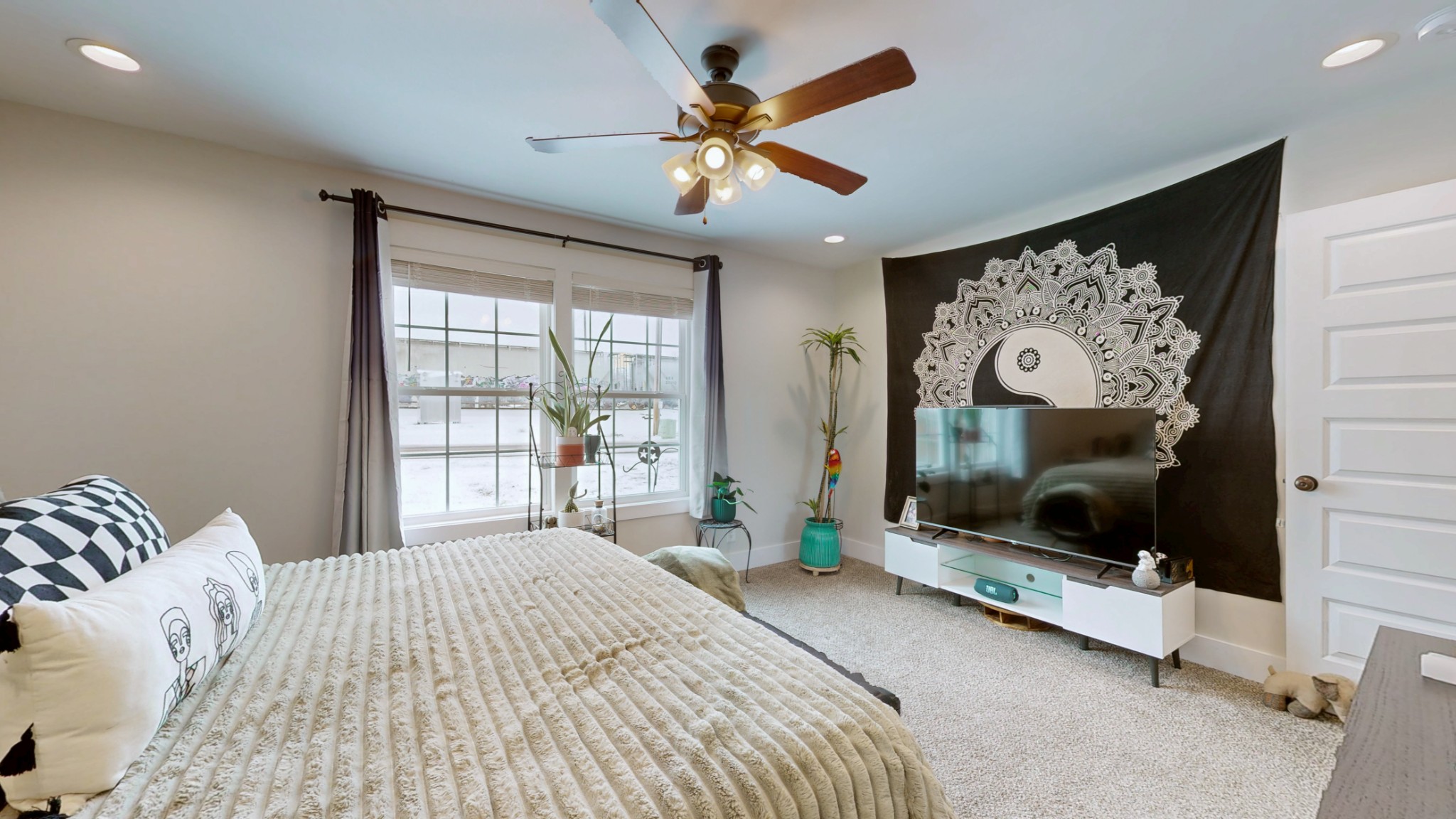 1093 Main Street Greenbrier, TN 37073 - Photo 13 of 26 a bedroom with a bed and a flat screen tv