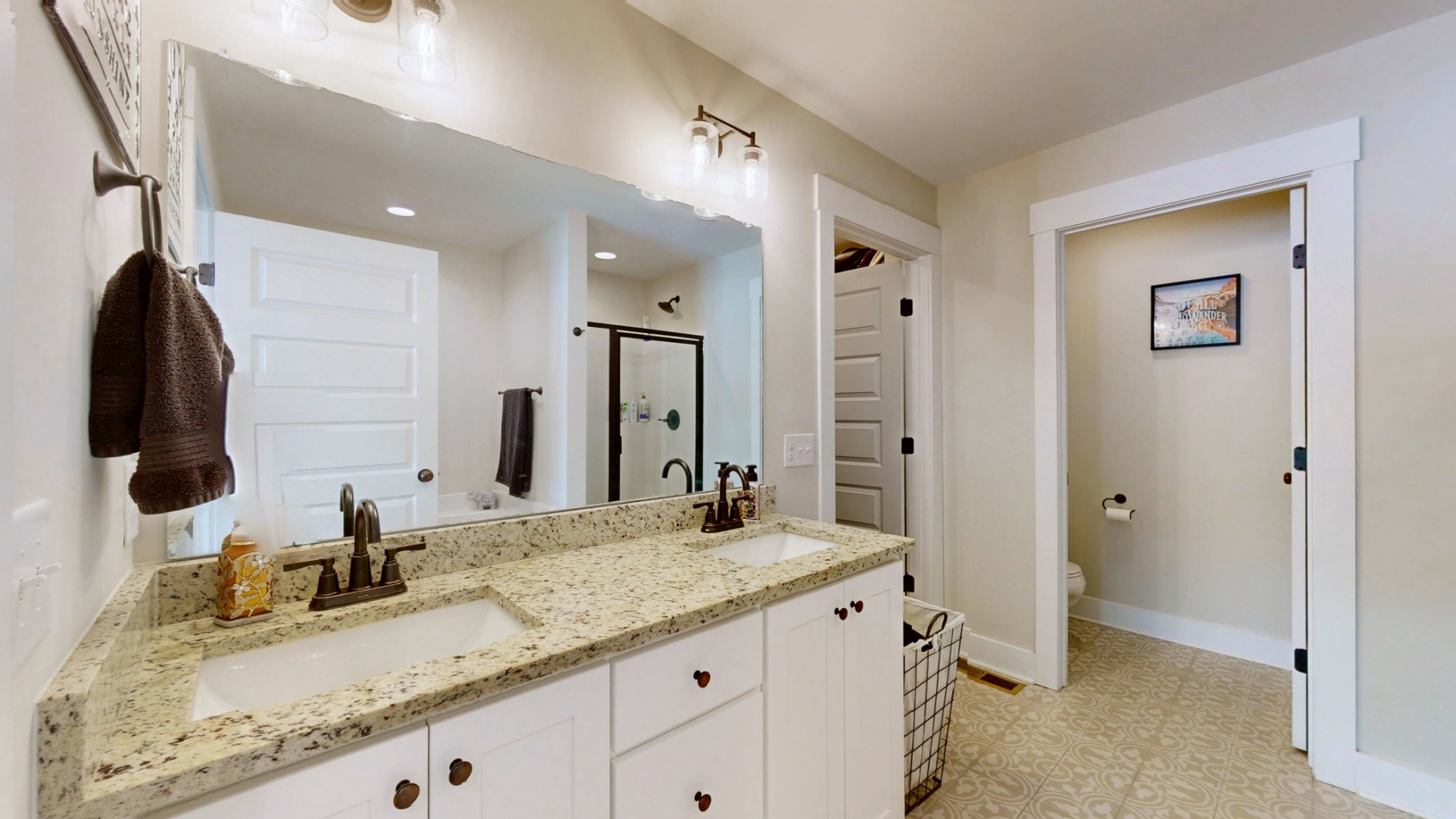 1093 Main Street Greenbrier, TN 37073 - Photo 14 of 26 a bathroom with a granite countertop sink and a mirror