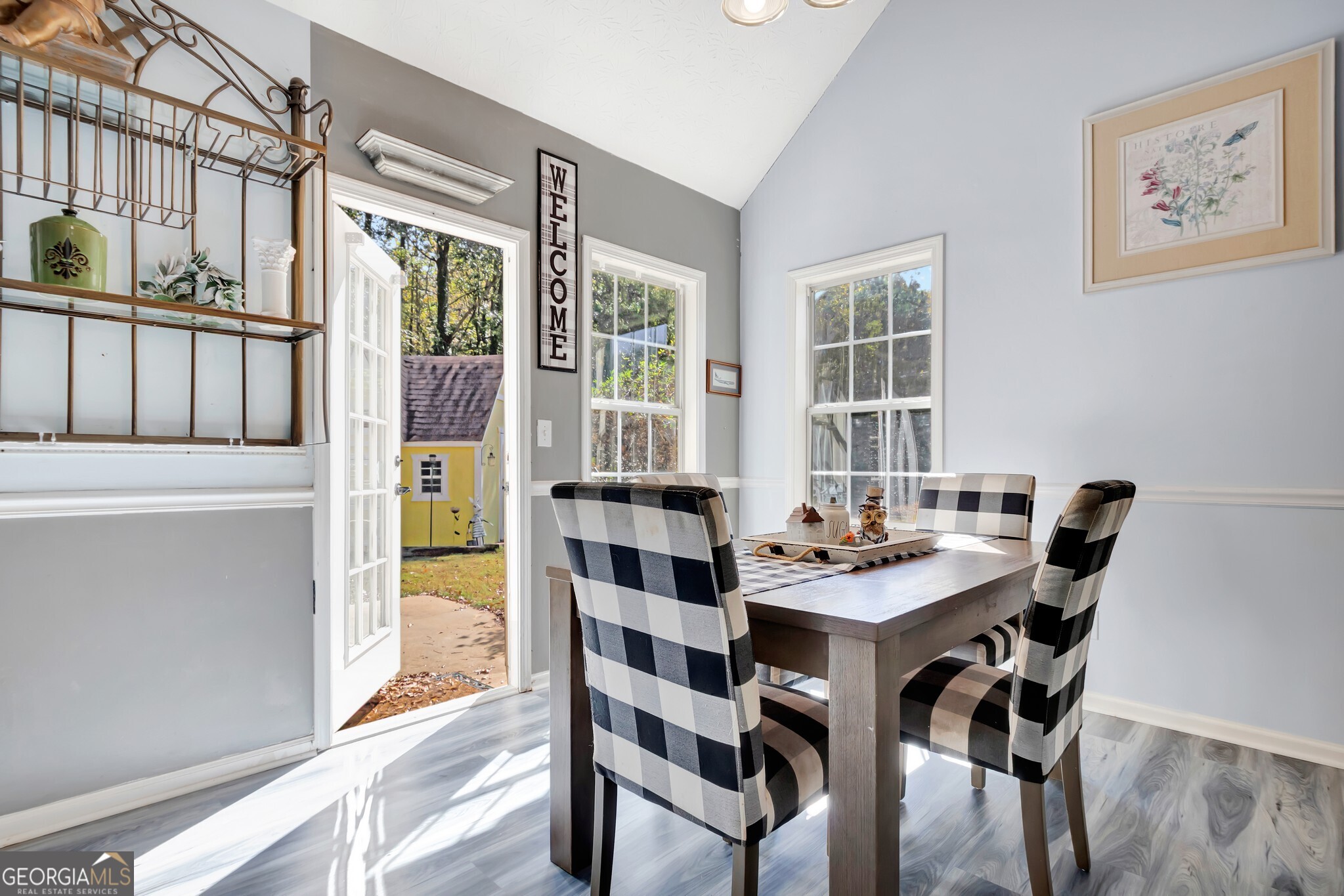 2040 Elm Grove Lane Hampton, GA 30228 - Photo 14 of 38 a view of a dining room with furniture window and wooden floor