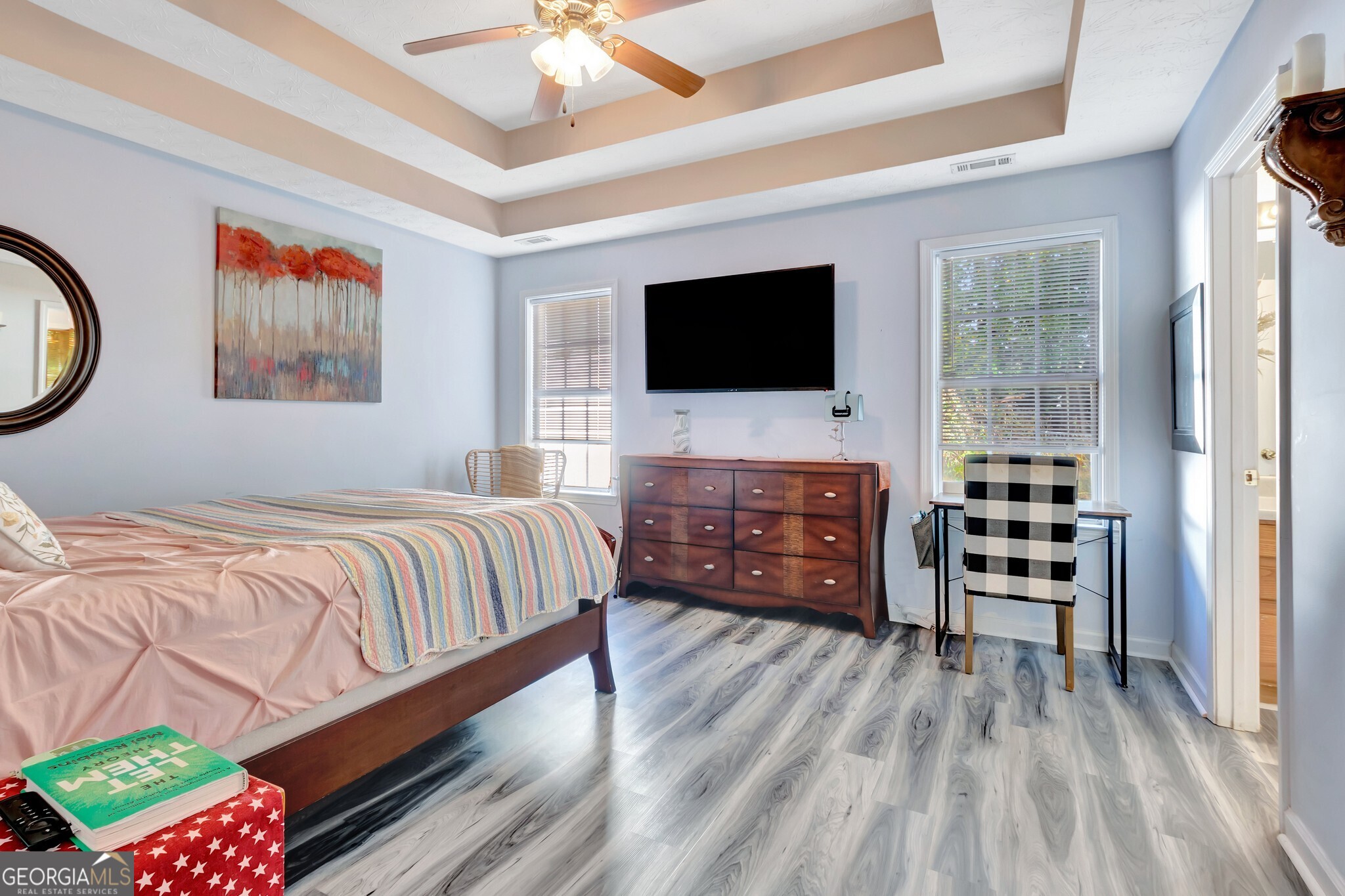 2040 Elm Grove Lane Hampton, GA 30228 - Photo 25 of 38 a spacious bedroom with a bed and a flat screen tv