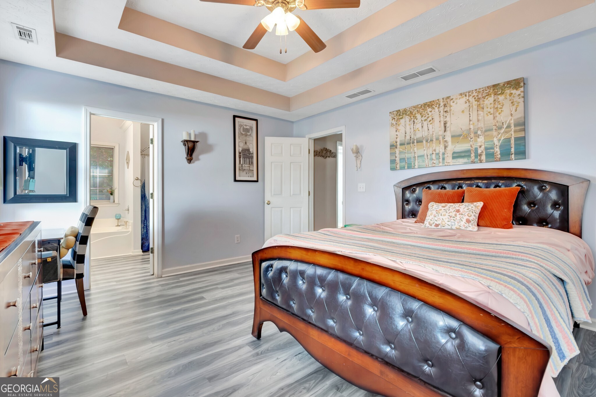 2040 Elm Grove Lane Hampton, GA 30228 - Photo 27 of 38 a bedroom with a bed a table and chair