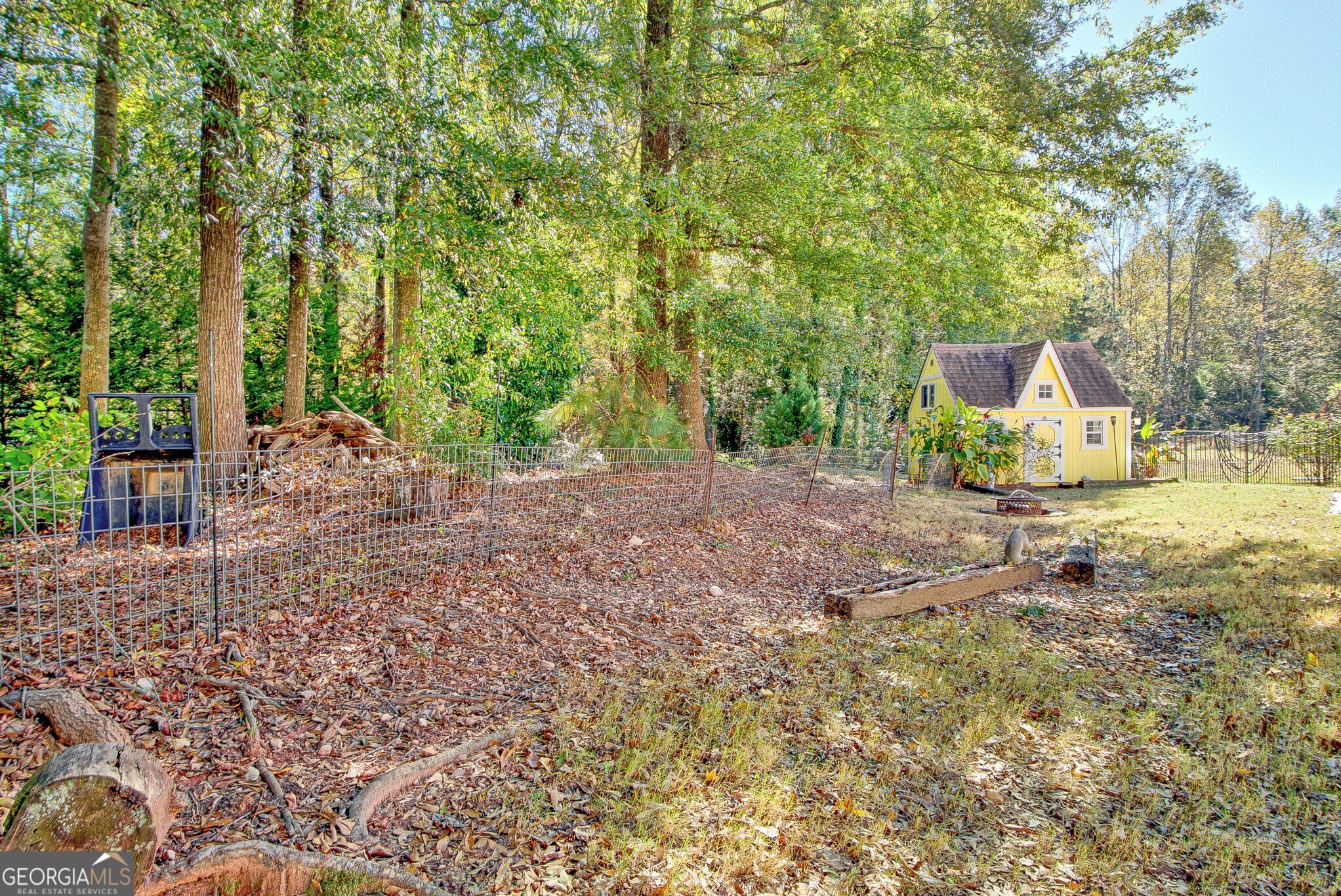 2040 Elm Grove Lane Hampton, GA 30228 - Photo 38 of 38 a view of a backyard with large trees