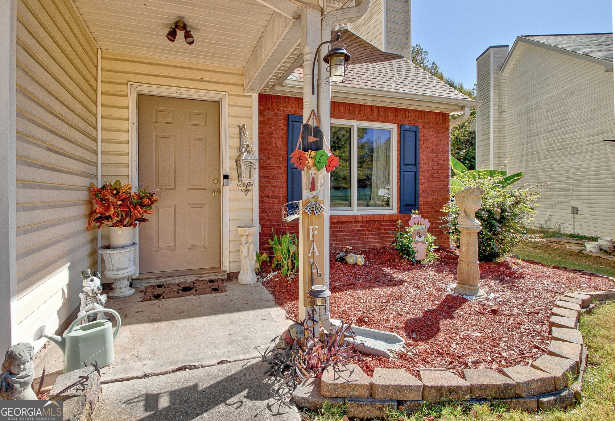 2040 Elm Grove Lane Hampton, GA 30228 - Photo 5 of 38 front view of a house with a potted plant