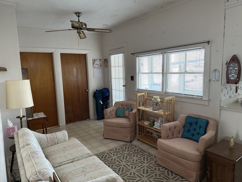9 Shea Street Salisbury, MA 01952 - Photo 3 of 8 a living room with furniture and a large window