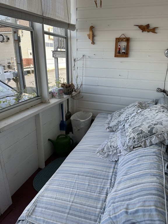 9 Shea Street Salisbury, MA 01952 - Photo 4 of 8 a bedroom with a bed and a large window