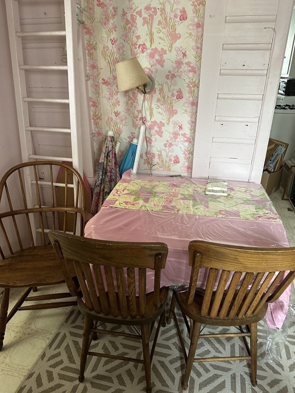 9 Shea Street Salisbury, MA 01952 - Photo 7 of 8 a view of a balcony with table and chairs