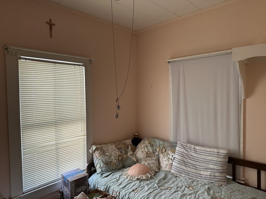 9 Shea Street Salisbury, MA 01952 - Photo 8 of 8 a bedroom with a bed and a window