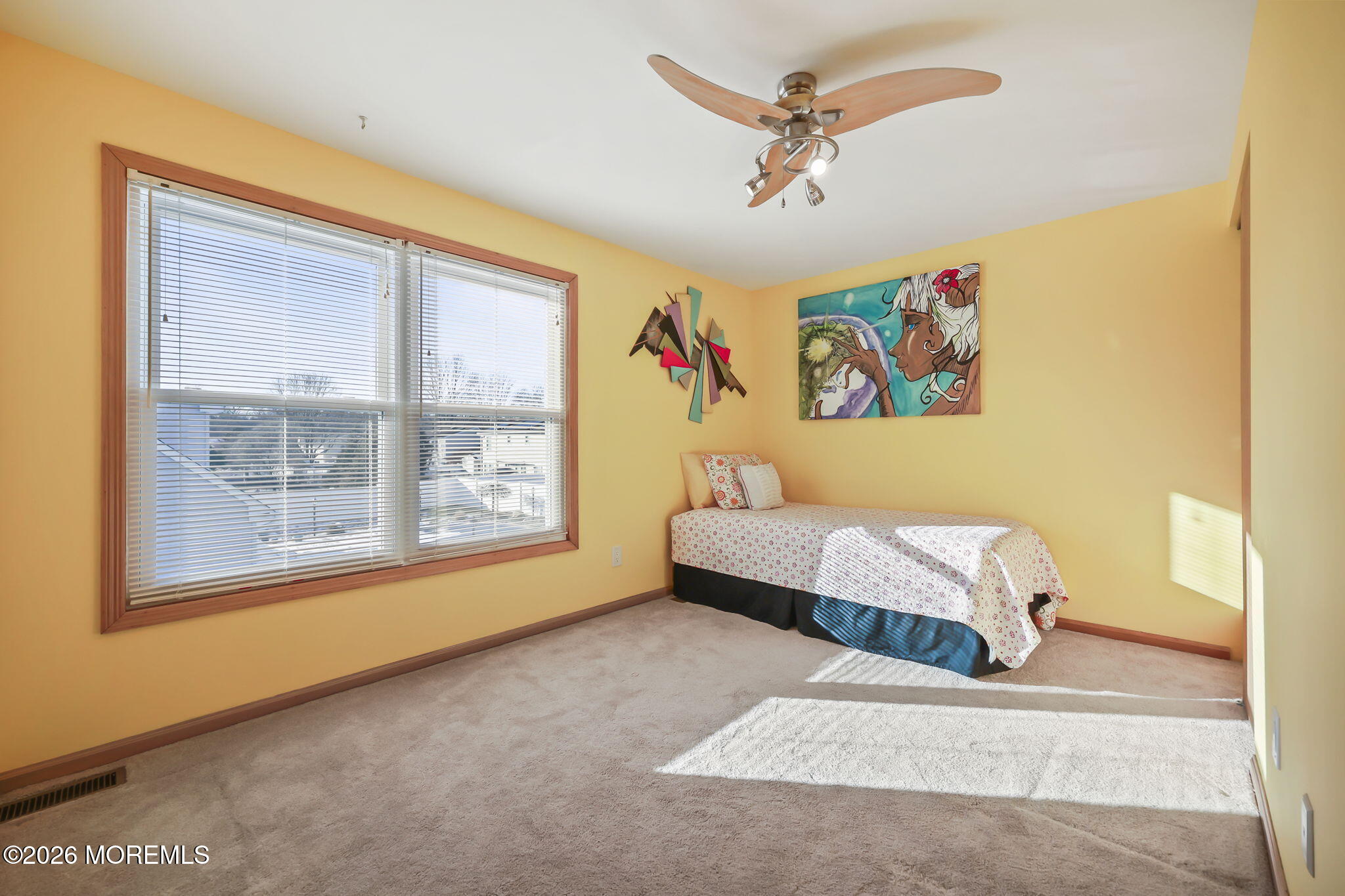 31 Sweetbriar Trail Howell, NJ 07731 - Photo 13 of 43 a bedroom with a bed and a large window