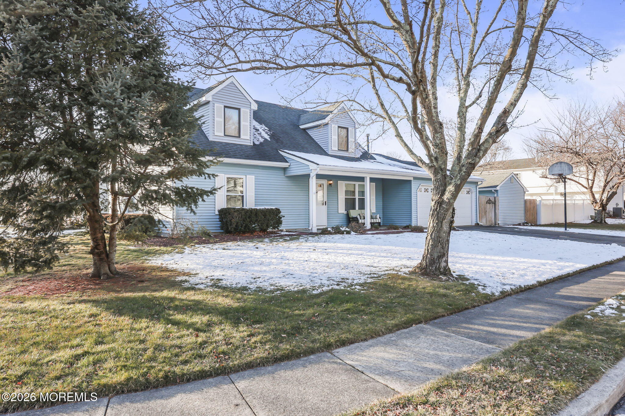 31 Sweetbriar Trail Howell, NJ 07731 - Photo 33 of 43 a front view of a house with a yard and garage