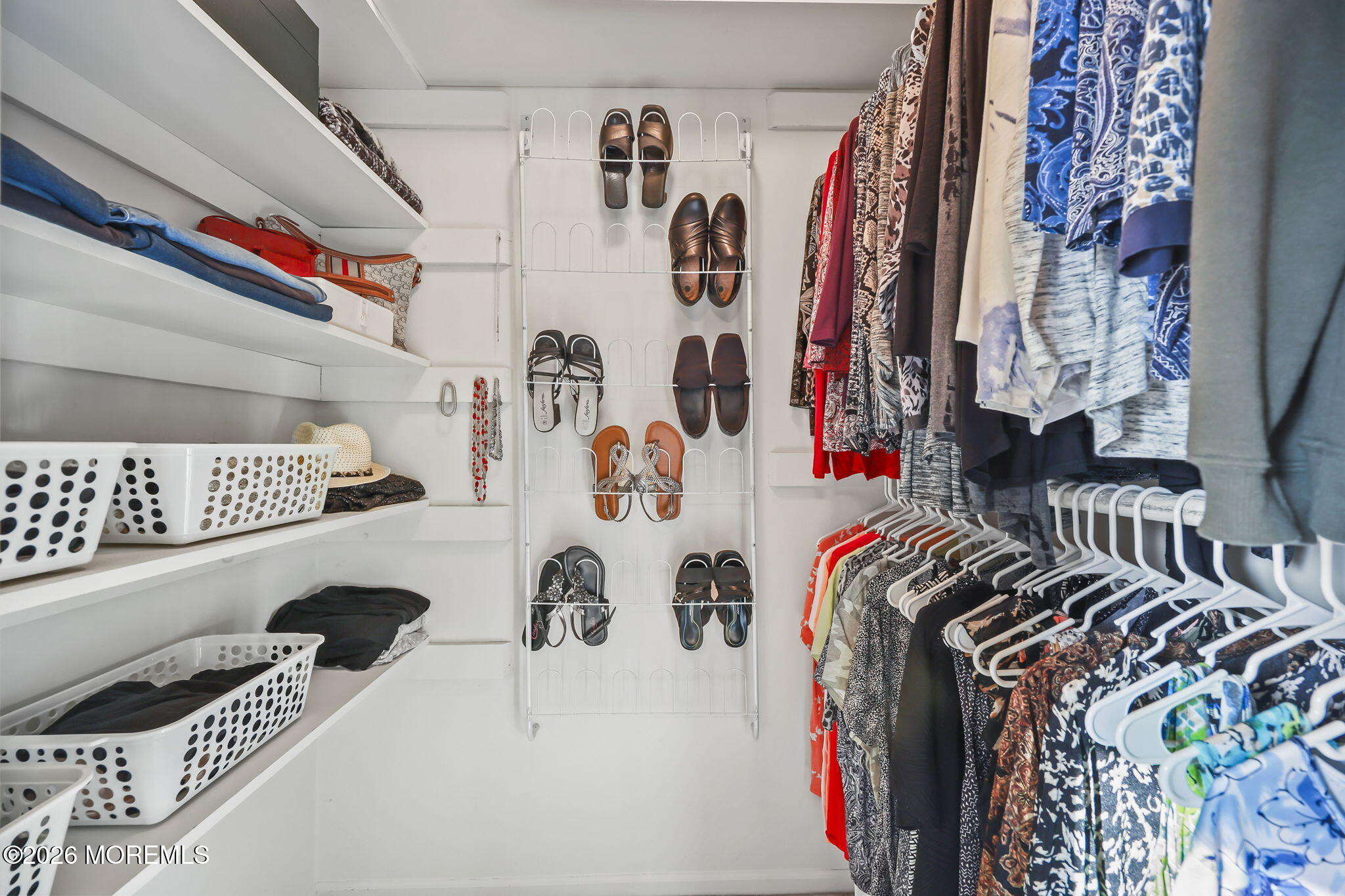 31 Sweetbriar Trail Howell, NJ 07731 - Photo 9 of 43 a view of walk in closet with clothes and shoes