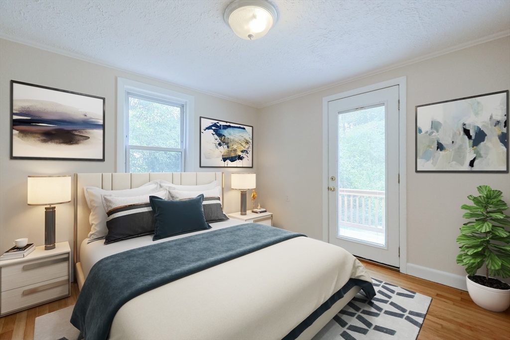 17 Chace Avenue Pepperell, MA 01463 - Photo 19 of 29 a bedroom with bed and wooden floor