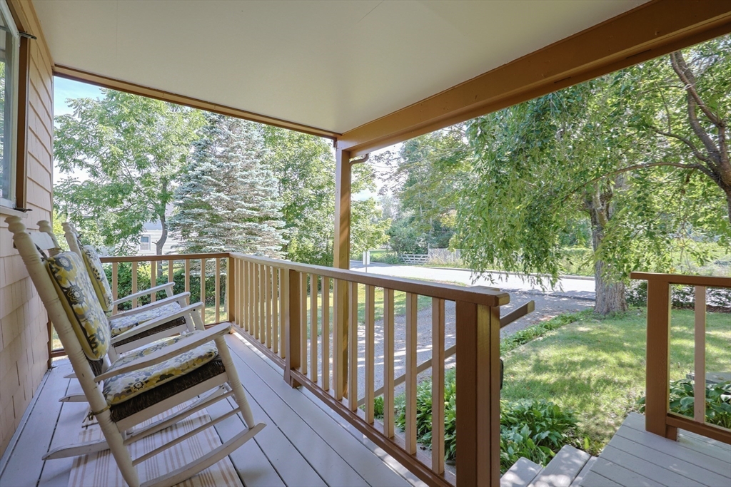 17 Chace Avenue Pepperell, MA 01463 - Photo 2 of 29 a view of a two chairs in the balcony