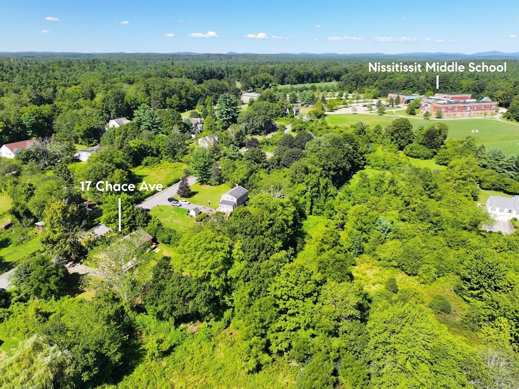 17 Chace Avenue Pepperell, MA 01463 - Photo 4 of 29 a view of a city