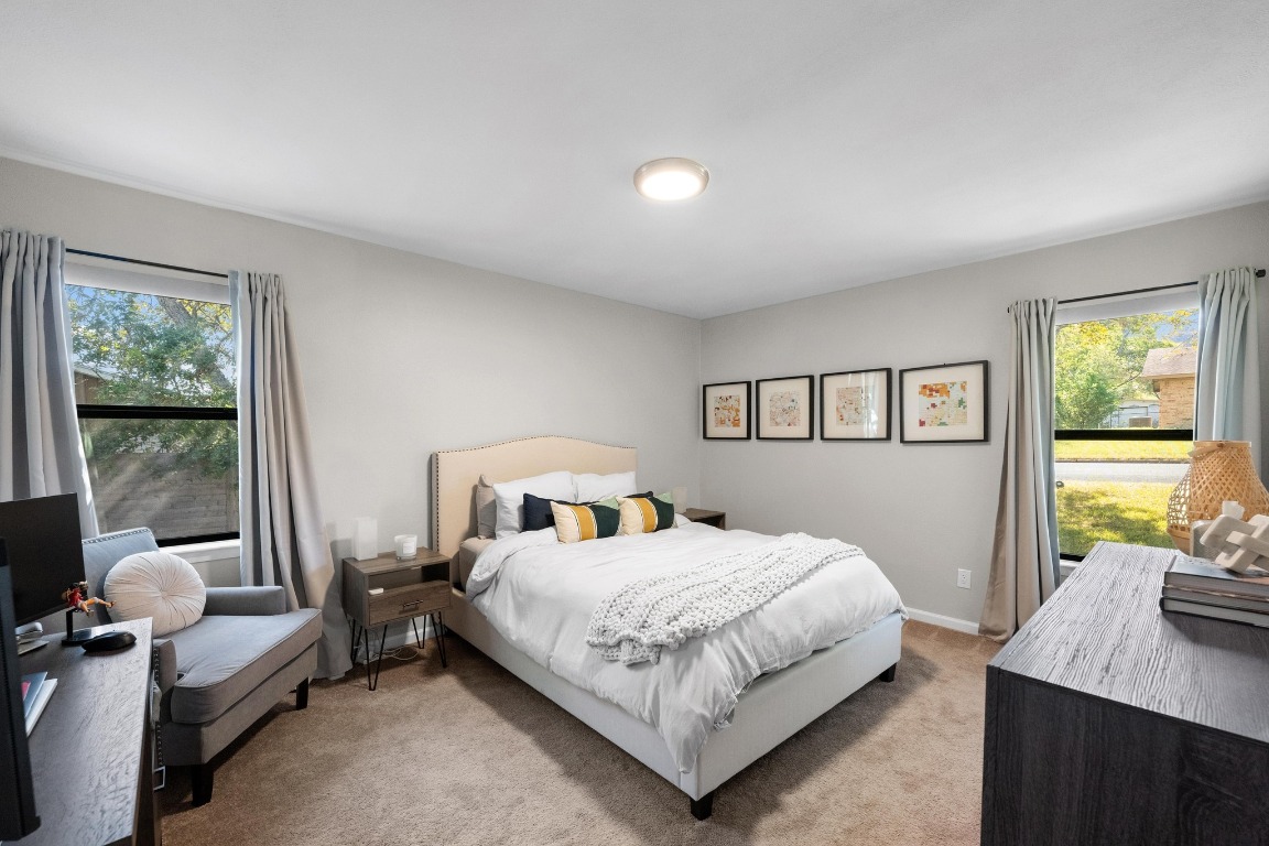 1006 Hollybluff Street Austin, TX 78753 - Photo 19 of 27 Bedroom featuring carpet and baseboards