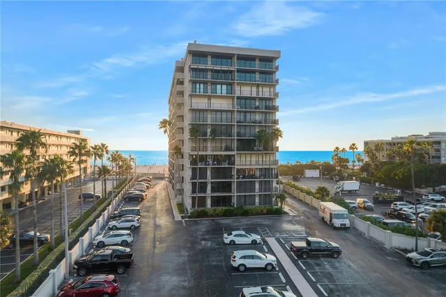 a view of a city street with tall buildings