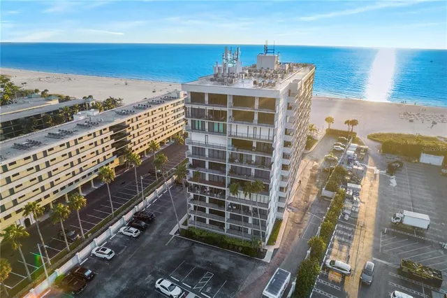 a view of a balcony with wooden floor