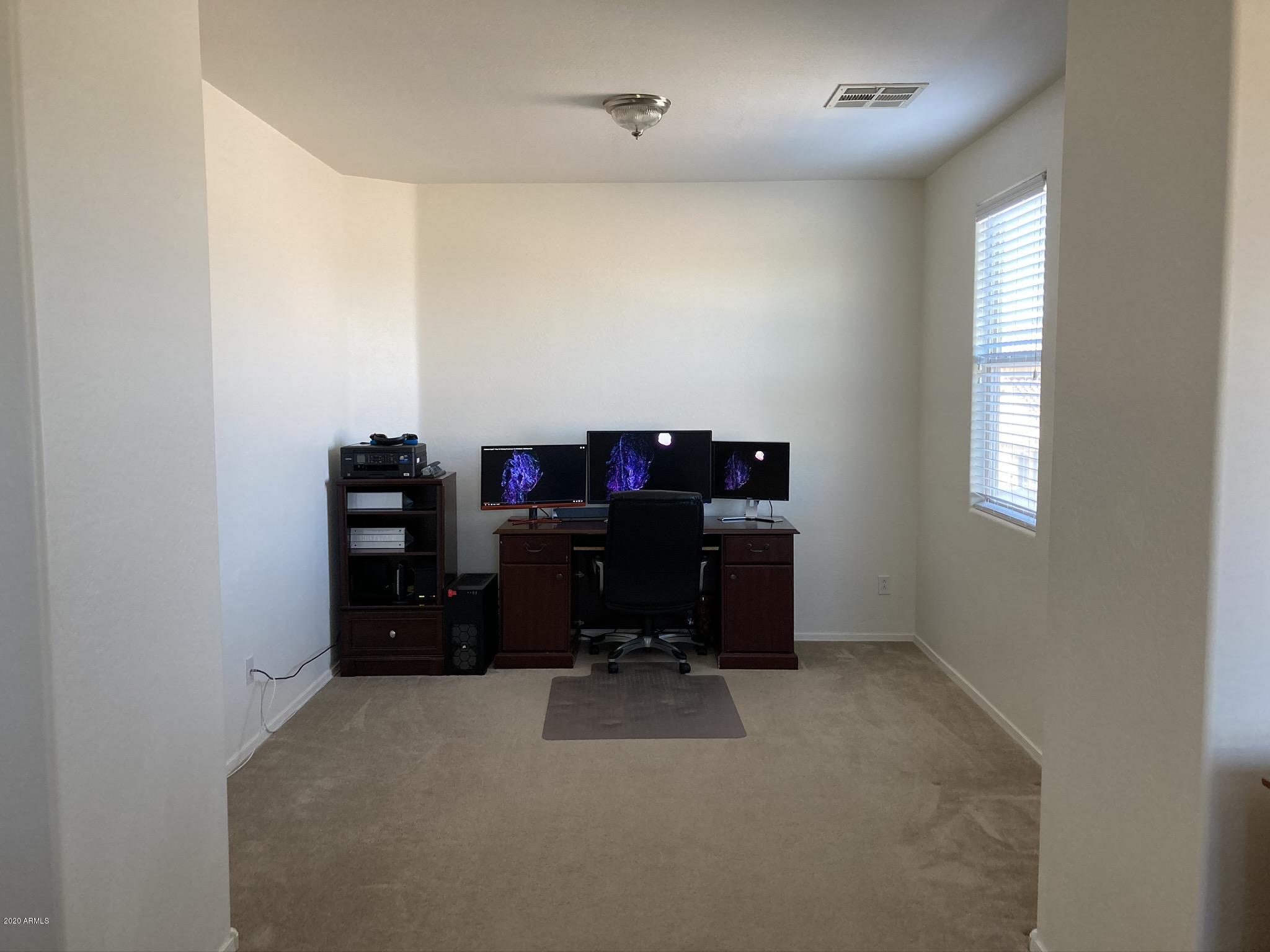7342 West Carter Road Laveen, AZ 85339 - Photo 13 of 18 a view of workspace with windows