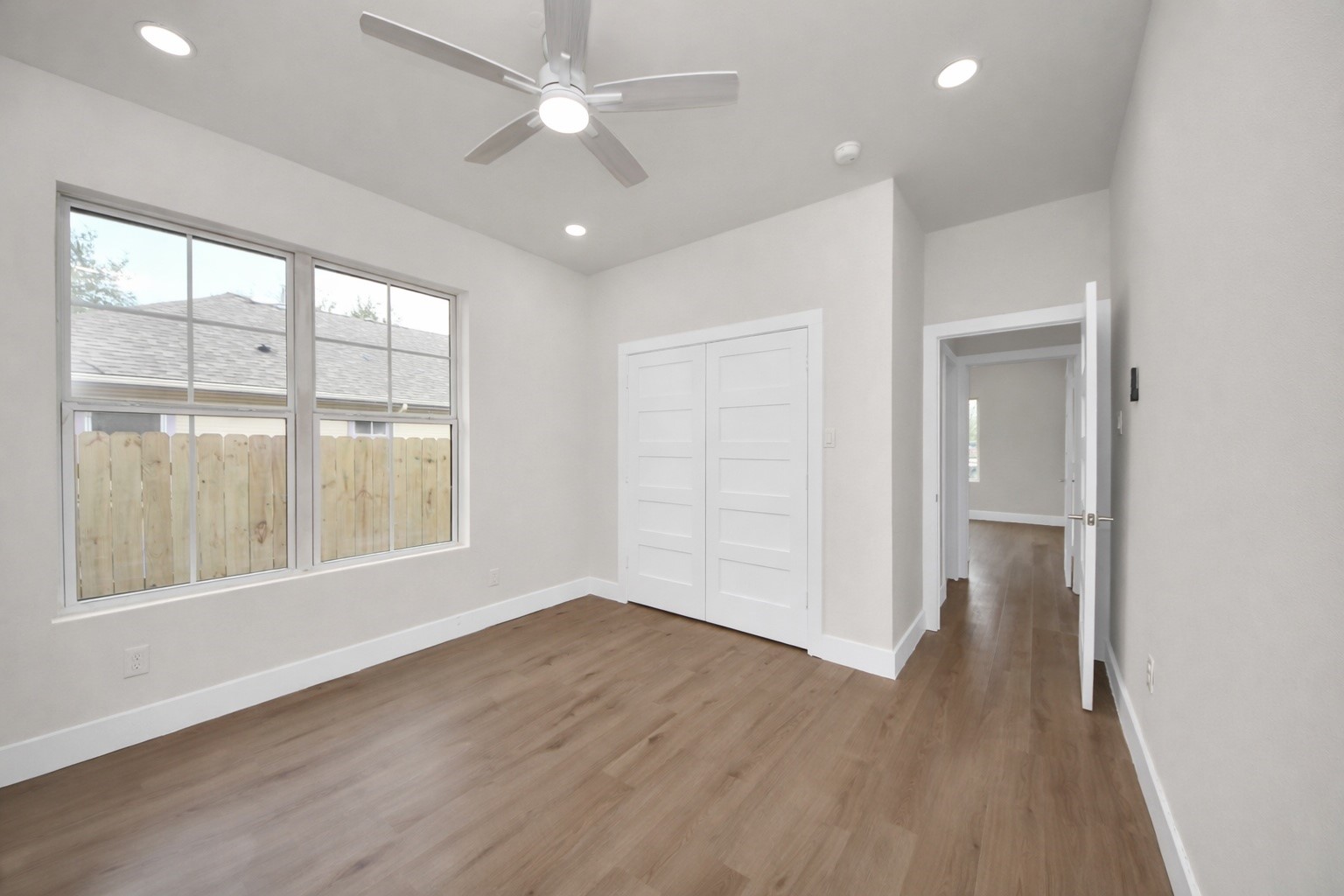 427 North Milby Street Houston, TX 77003 - Photo 25 of 44 wooden floor in an empty room with a window
