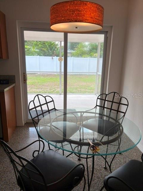 11601 109th Street Seminole, FL 33778 - Photo 6 of 29 a view of a dining room with furniture window and outside view
