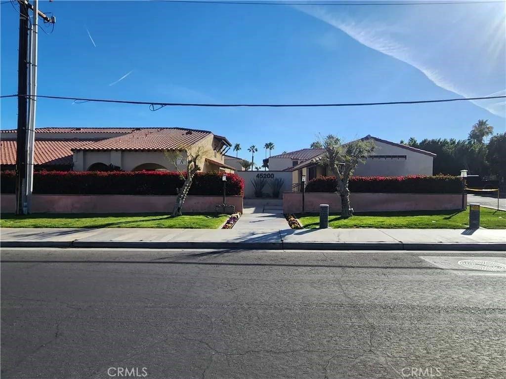 45200 Deep Canyon Road Palm Desert, CA 92260 - Photo 1 of 14 front view of a house with a small yard