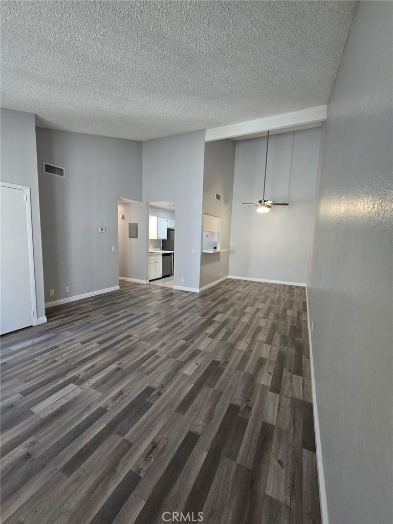 45200 Deep Canyon Road Palm Desert, CA 92260 - Photo 2 of 14 a view of empty room with wooden floor