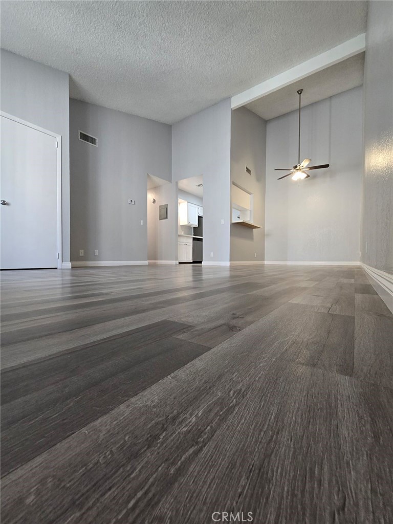 45200 Deep Canyon Road Palm Desert, CA 92260 - Photo 3 of 14 a view of a livingroom with wooden floor