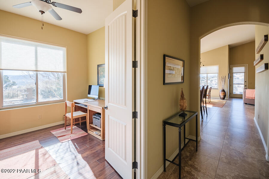 1594 Rustling Wind Place Prescott, AZ 86301 - Photo 12 of 47 a view of a hallway to a livingroom with furniture