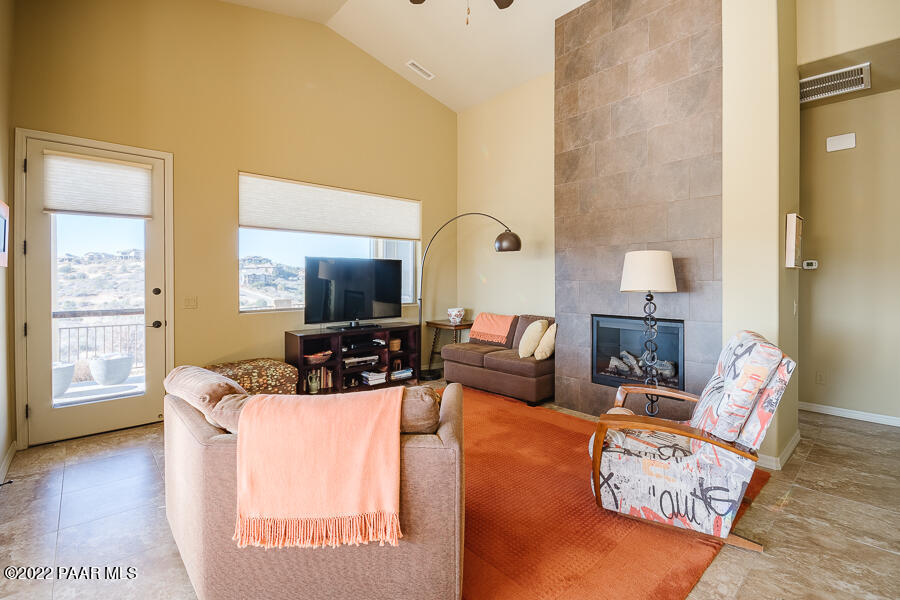 1594 Rustling Wind Place Prescott, AZ 86301 - Photo 21 of 47 a living room with furniture window and wooden floor