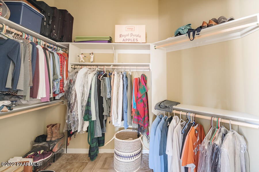 1594 Rustling Wind Place Prescott, AZ 86301 - Photo 29 of 47 a view of walk in closet with clothes and shoes