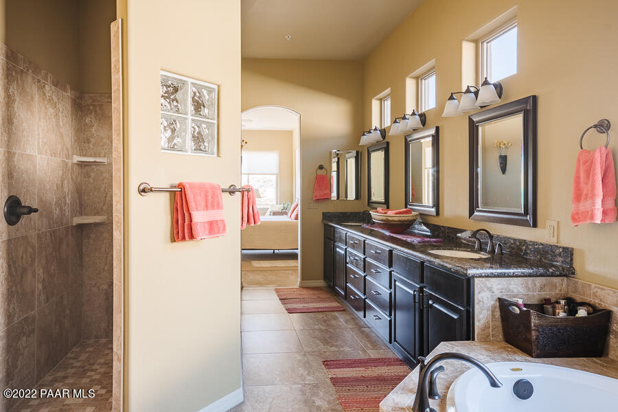 1594 Rustling Wind Place Prescott, AZ 86301 - Photo 30 of 47 a bathroom with a sink and a mirror