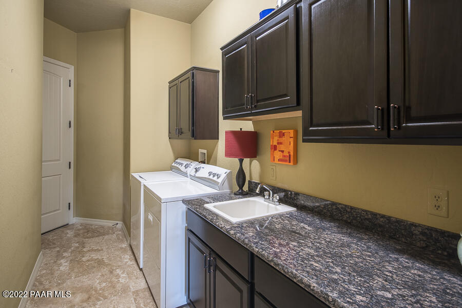 1594 Rustling Wind Place Prescott, AZ 86301 - Photo 32 of 47 a bathroom with a sink and a mirror