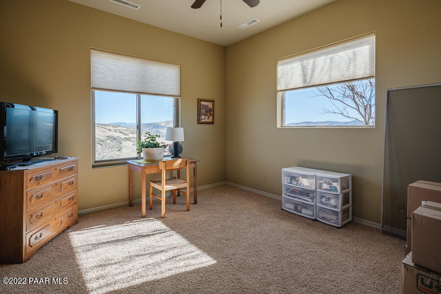 1594 Rustling Wind Place Prescott, AZ 86301 - Photo 38 of 47 a room with furniture and flat screen tv