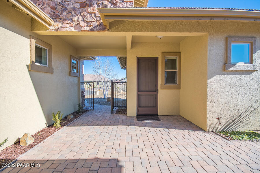 1594 Rustling Wind Place Prescott, AZ 86301 - Photo 42 of 47 a view of a house with a backyard