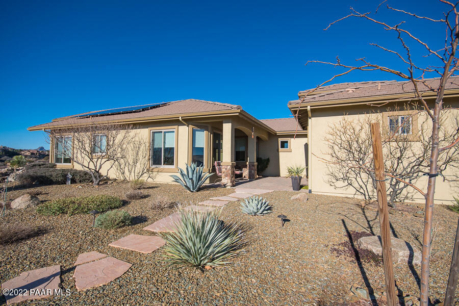 1594 Rustling Wind Place Prescott, AZ 86301 - Photo 45 of 47 a front view of a house with garden
