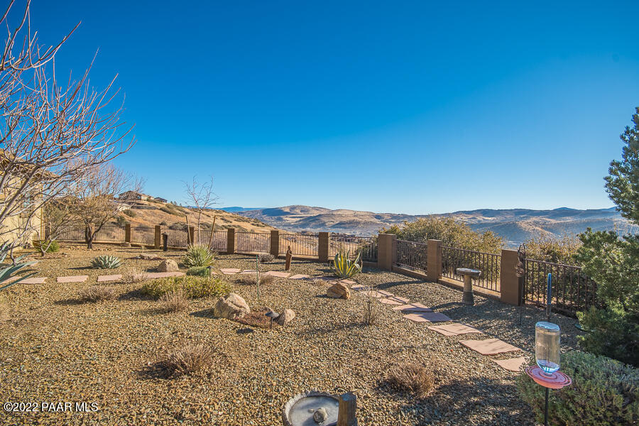 1594 Rustling Wind Place Prescott, AZ 86301 - Photo 46 of 47 a view of a houses with a yard