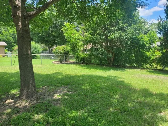 a view of an outdoor space and a yard