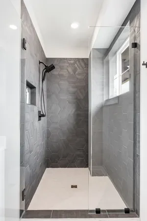 a kitchen with a sink a stove and cabinets