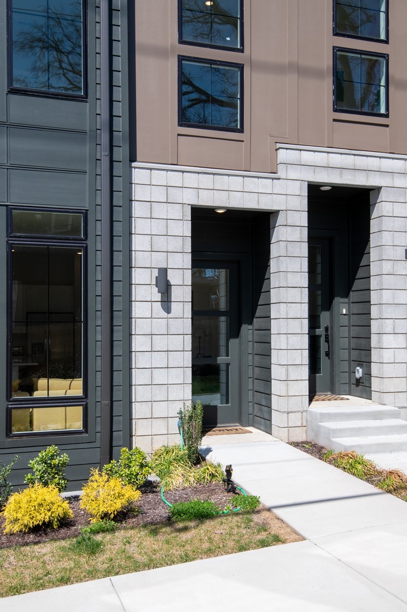 1233 Lischey Avenue Nashville, TN 37207 - Photo 30 of 89 a front view of a house with a garage