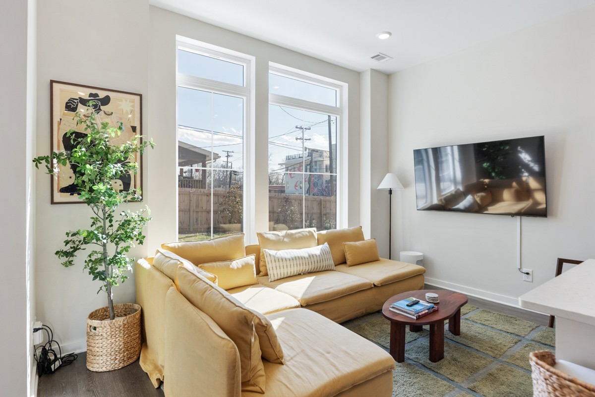 1233 Lischey Avenue Nashville, TN 37207 - Photo 33 of 89 a living room with furniture and a large window