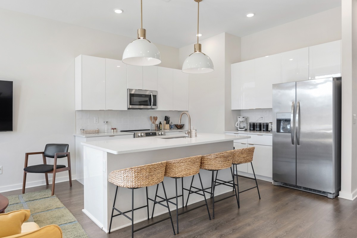 1233 Lischey Avenue Nashville, TN 37207 - Photo 37 of 89 a kitchen with stainless steel appliances granite countertop a sink a stove a refrigerator and island with wooden floor