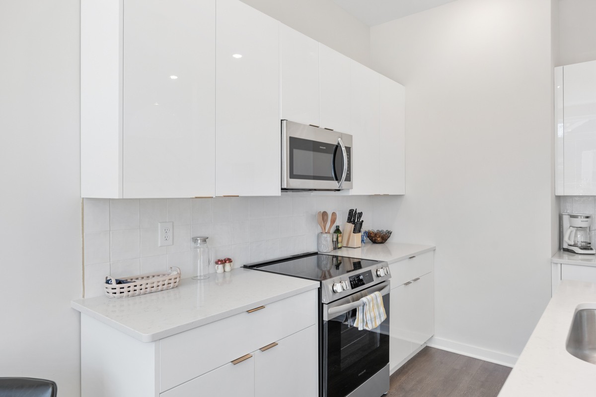 1233 Lischey Avenue Nashville, TN 37207 - Photo 39 of 89 a kitchen with a sink stove and cabinets
