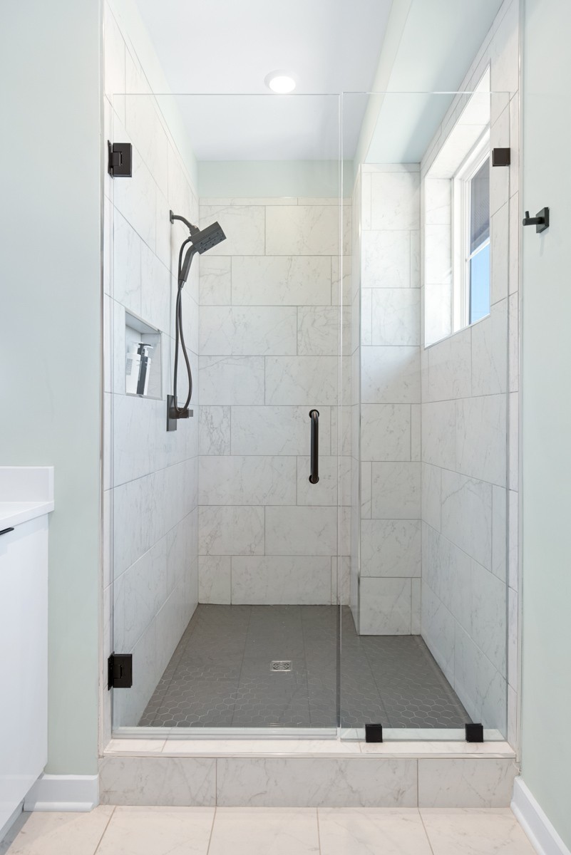 1233 Lischey Avenue Nashville, TN 37207 - Photo 55 of 89 a bathroom with a glass door shower
