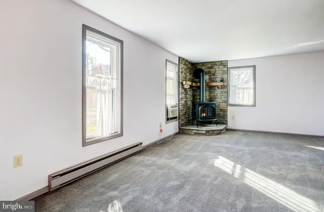 an empty room with windows