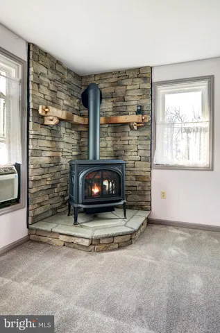 a living room with fireplace