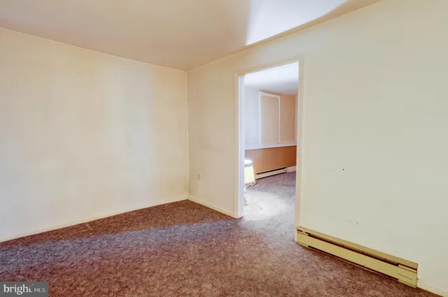 an empty room with closet