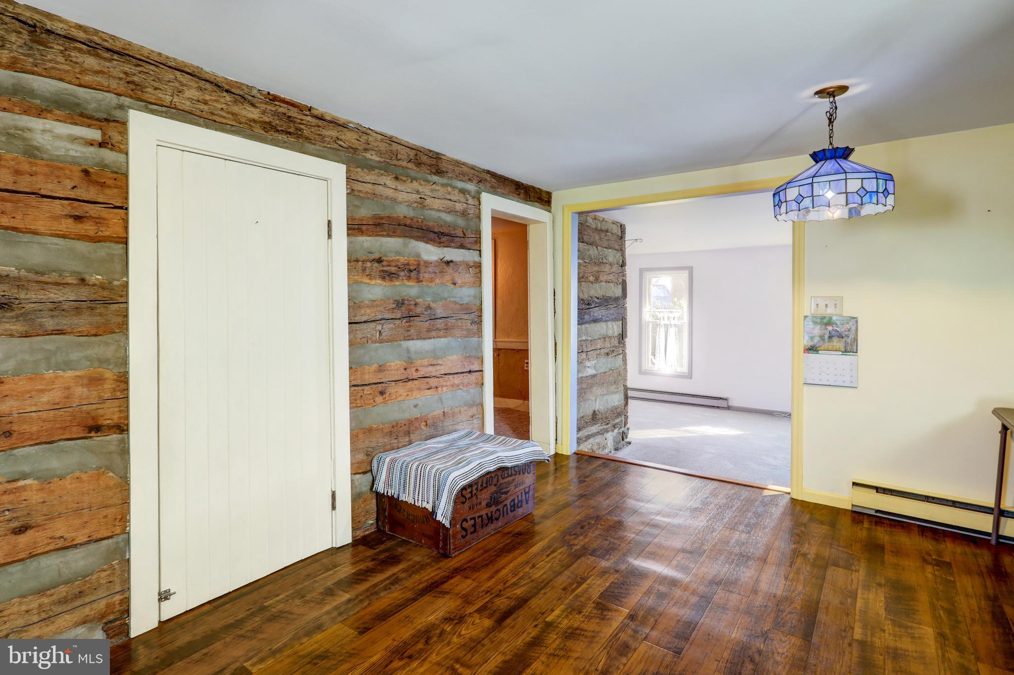 206 Pleasant Hill Drive Lititz, PA 17543 - Photo 20 of 35 a view of a bedroom with wooden floor and windows