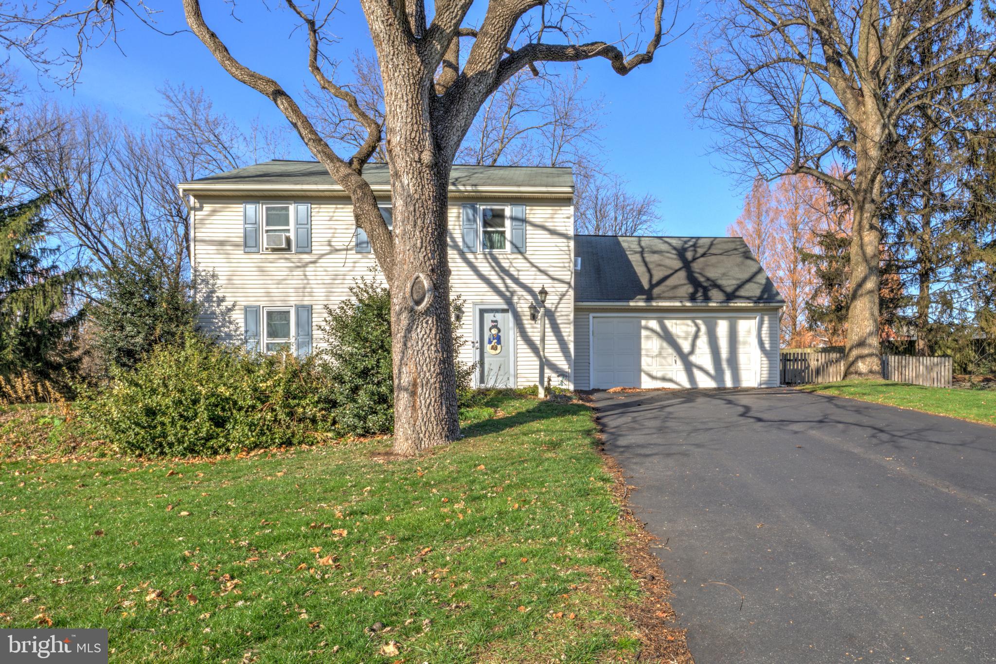 206 Pleasant Hill Drive Lititz, PA 17543 - Photo 2 of 35 front view of a house with a yard